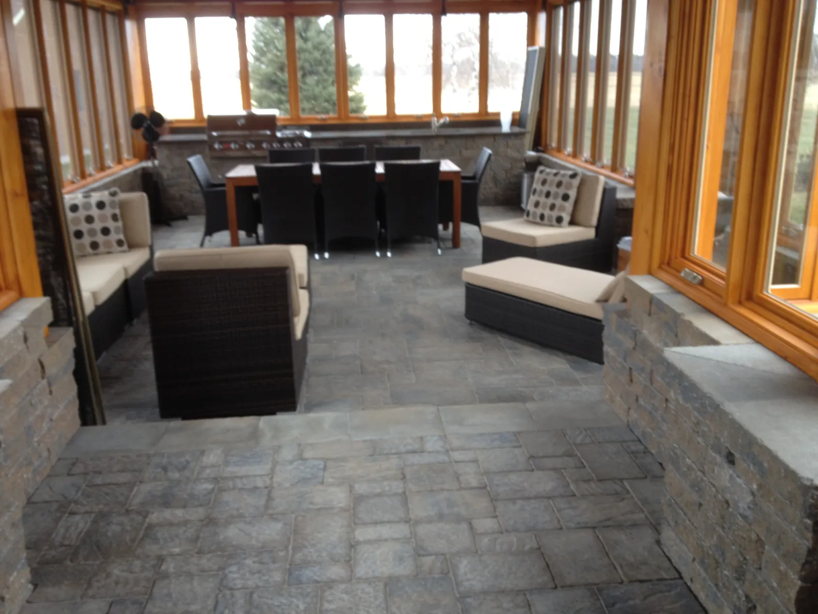 Muret de pierre et aménagement paysager